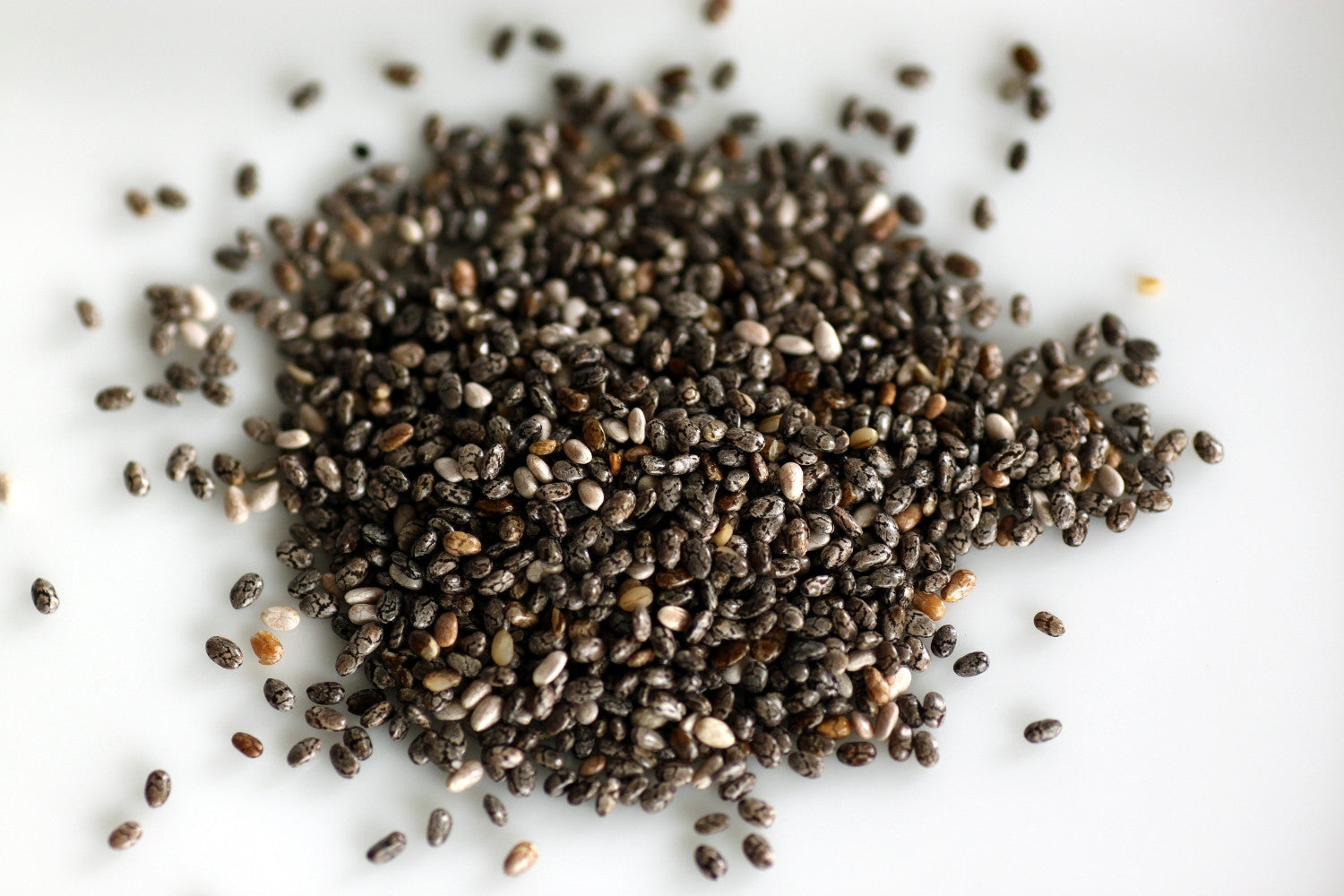 a handful of scattered chia seeds